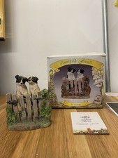 Countryside friends by leonardo two dogs jumping on fence