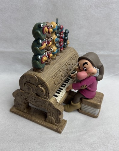 Piano playing grumpy figure - grumpy,