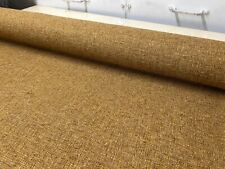 Plain upholstery material  Textured boucle by  Next fabrics 140 cms wide gold