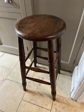Antique stool ideal for paying guitar.