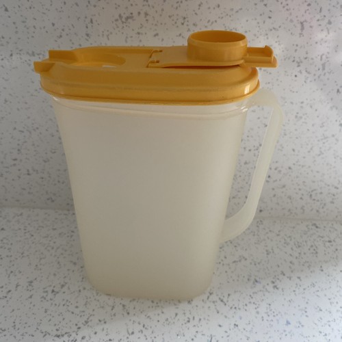 Tupperware yellow top jug - yellow,
