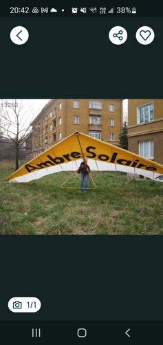 Paragliders and hang gliders - and,
