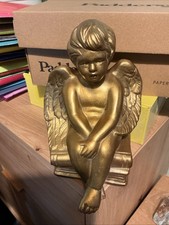 Ceramic Cherub Angel sitting on books,19cm decorative figurine.