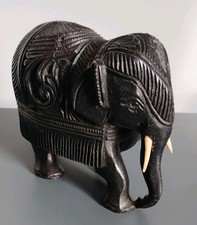 Vintage black hand carved wooden elephant ornament made in India