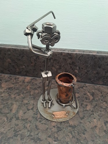 Hintz kuntz golfing statue - kuntz,