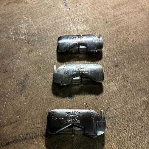 Three rolling rock new - three,