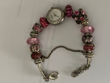 Camilia Watch, 12 charms, 1 safety chain 