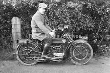 hbn-58 Royal Enfield Motorcycle and Rider. Photo