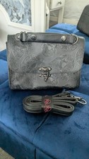 Rare Iron Fist Embossed Skull