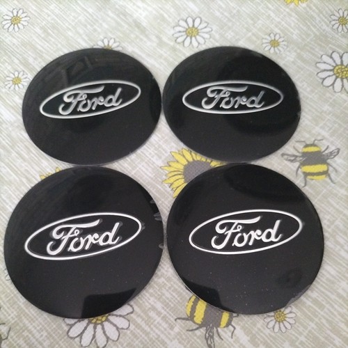 Black ford alloy wheel - x,