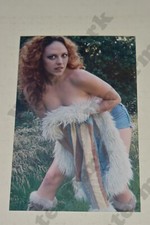 busty redhead woman in denim