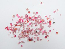 Watchmakers lot of vintage/antique pocket watch jewel holes. Parts