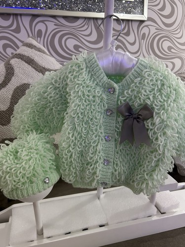 Hand knitted baby loopy - hand,