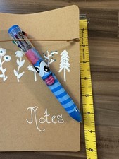 Hand decorated Notebook and Pen . New & unused. 8”x5” 