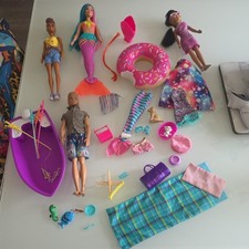 Large bundle of Barbie dolls amd accesorries boat mermaid ken etc 
