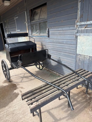 Bargain black wheeled - wheeled, pony