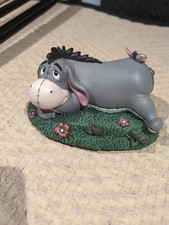 Disney Traditions Eeyore Lying Down In A Patch Of Grass Milne And E.H. Shepard