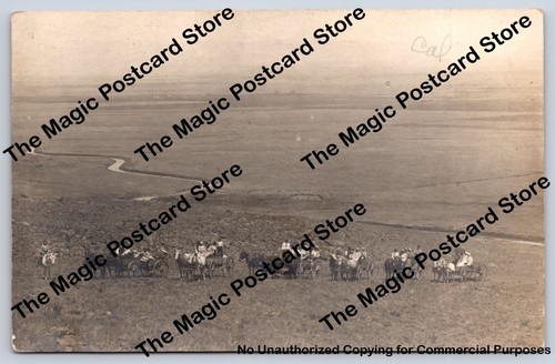 Horse drawn wagons distant - drawn,