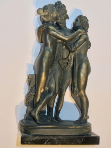Nude figurine graces women - -,