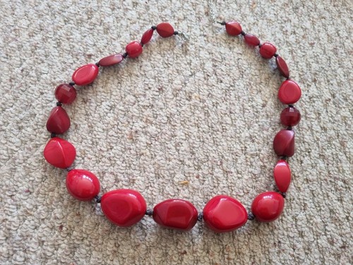 Graduated red plastic bead - graduated,