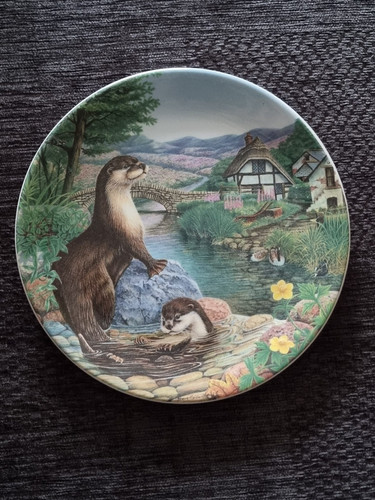 Otters play decorative - at,