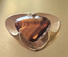 Sphinx Stamped Goldtone Brooch With Marbled Effect Centre Stone