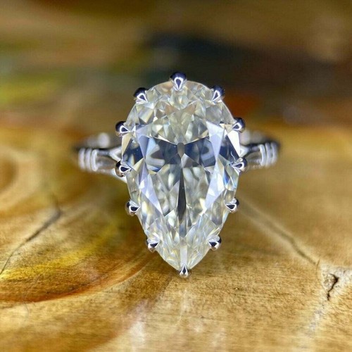 Pear cut solitaire - 4.00,