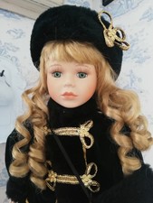 Leonardo Porcelain Doll in Winter Attire 16"