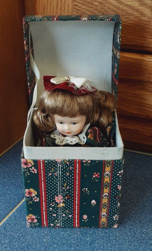 Vintage porcelain doll sitting - vintage,