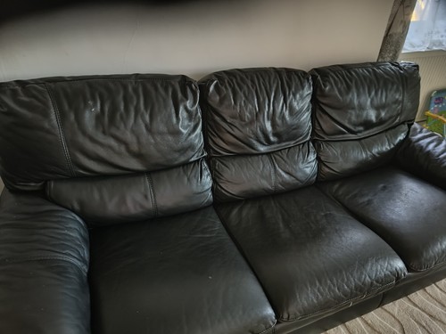 Two leather sofas - one,