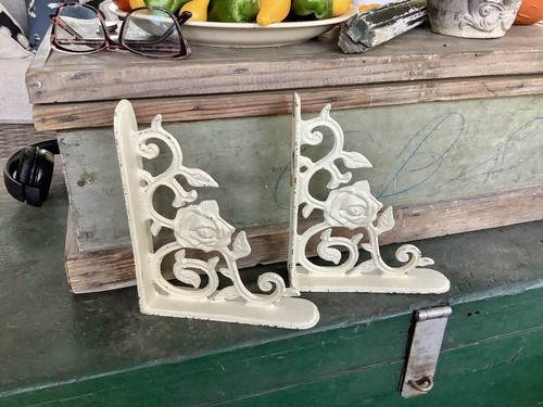 Pair white cast iron floral - of,
