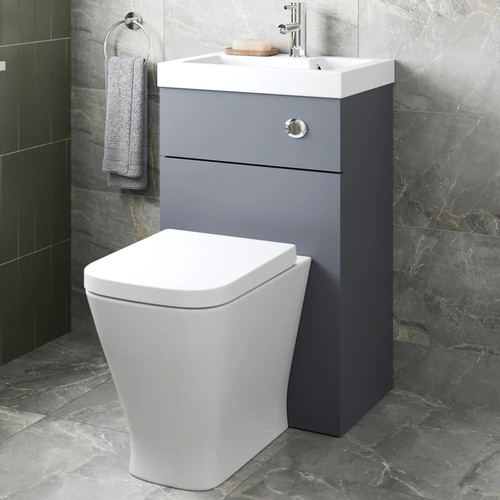 Back wall btw toilet - to,
