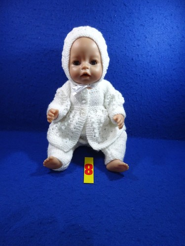 Hand knitted clothes for - hand,