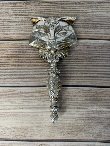 Silver cat hand - hand, mirror