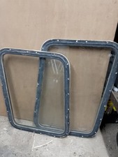 TWO DIFFERENT SHAPED BOAT OR CARAVAN WINDOWS
