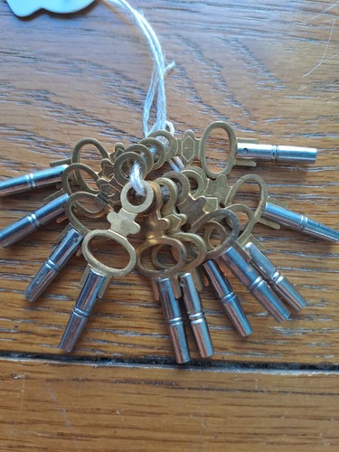 Antique brass clock winding - brass,