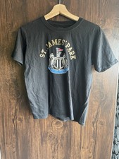 Official Newcastle United St James’ Park T-Shirt – Size XLB (Youth)