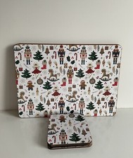 NEW CHRISTMAS SET 4 FESTIVE PLACEMATS COASTERS NUTCRACKER CANDY CANE TABLE.
