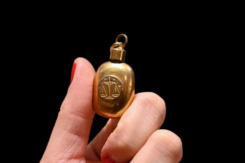 Antique gilt relief pocket