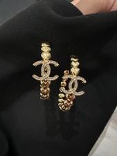 Gold Chanel CC hoop earrings