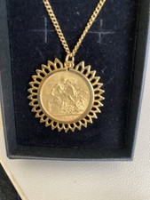 22ct Gold Sovereign Coin  and Pendant 9ct Yellow