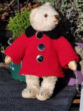 Hand knitted teddy bear
