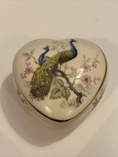 Vintage heart shaped peacock - shaped,