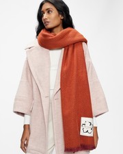 NIB designer Ted Baker burnt