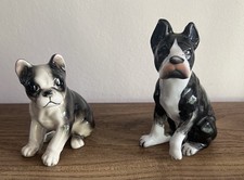 A pair of black and white China boxer dogs in good condition. 