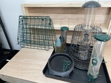 6 Various Bird Feeders + 2 Large Pails of Bird Feed - Seeds and Peanuts