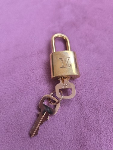 Louis vuitton brass padlock - brass,