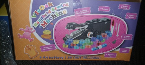 Handheld sewing machine - handheld,