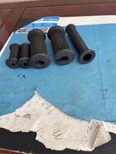 Triumph foot rest rubbers plus handlebar grip unused