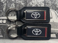 Two Toyota Keyrings Yaris Prius C-HR Land Cruiser Hulix Genuine Corolla